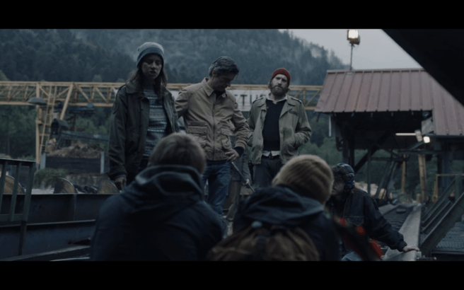 Black Spot S1Ep1 Laurene Bertrand Teddy at Sawmill Protest