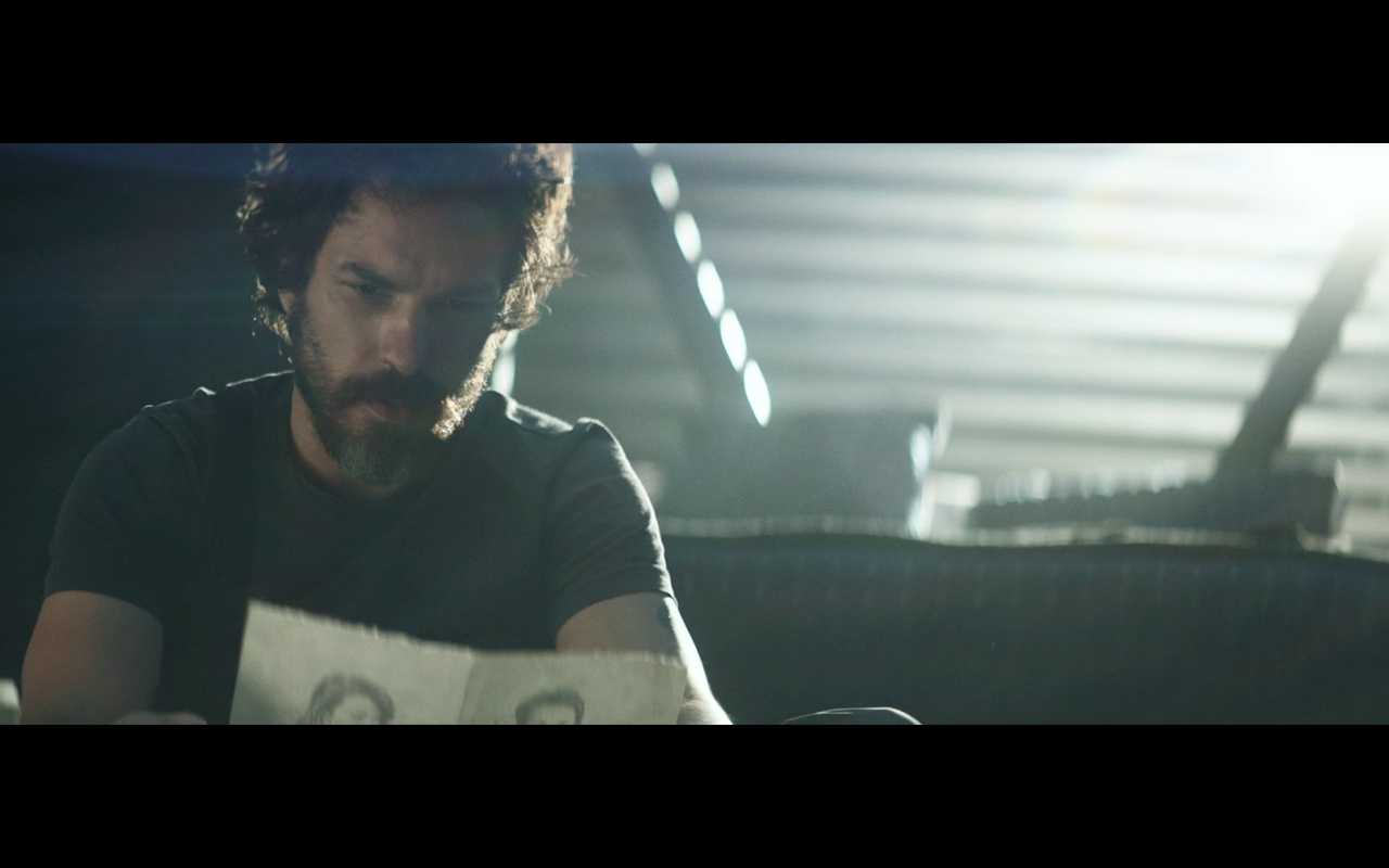 Star Trek Picard S1E8 Rios Looks at Drawing