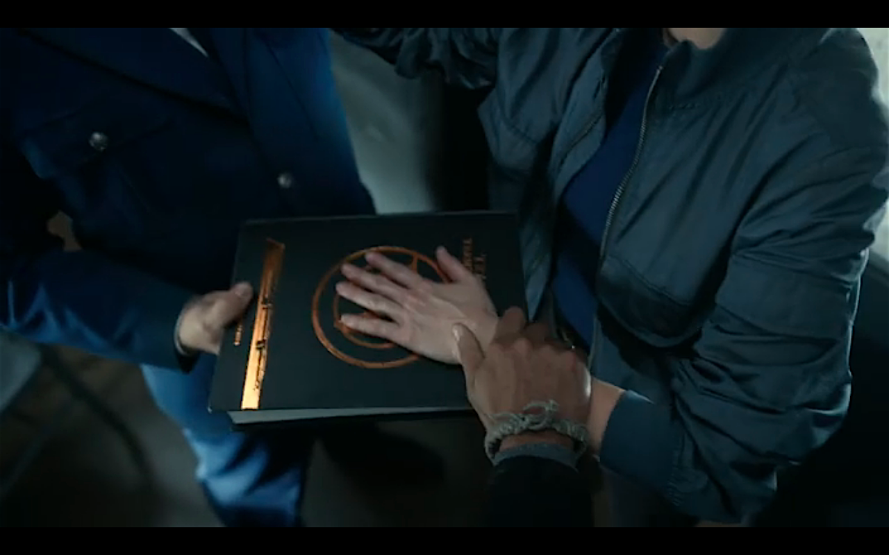 Snowpiercer S2Ep2 Bess' Hand on Wilford's Bible