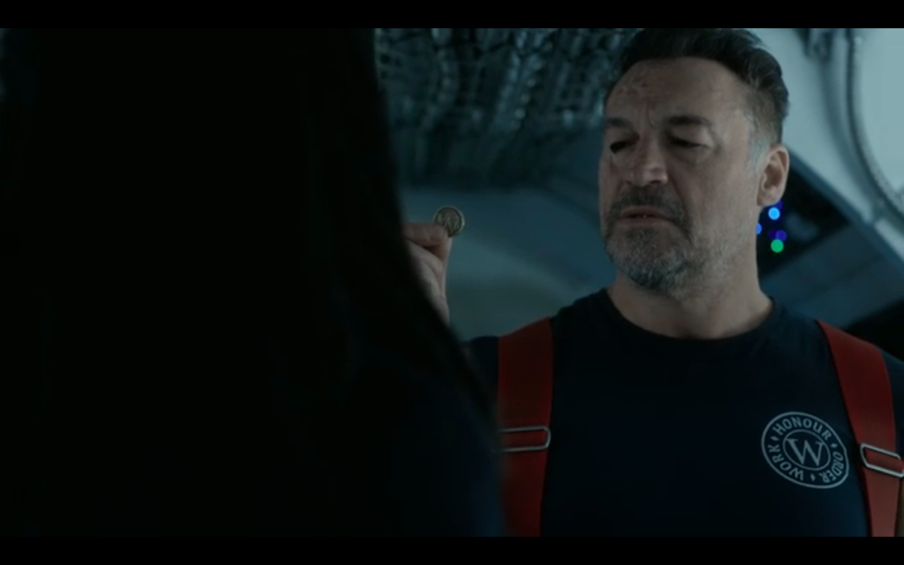 Snowpiercer S2Ep8 Boki with Breachman's Wilford Coin