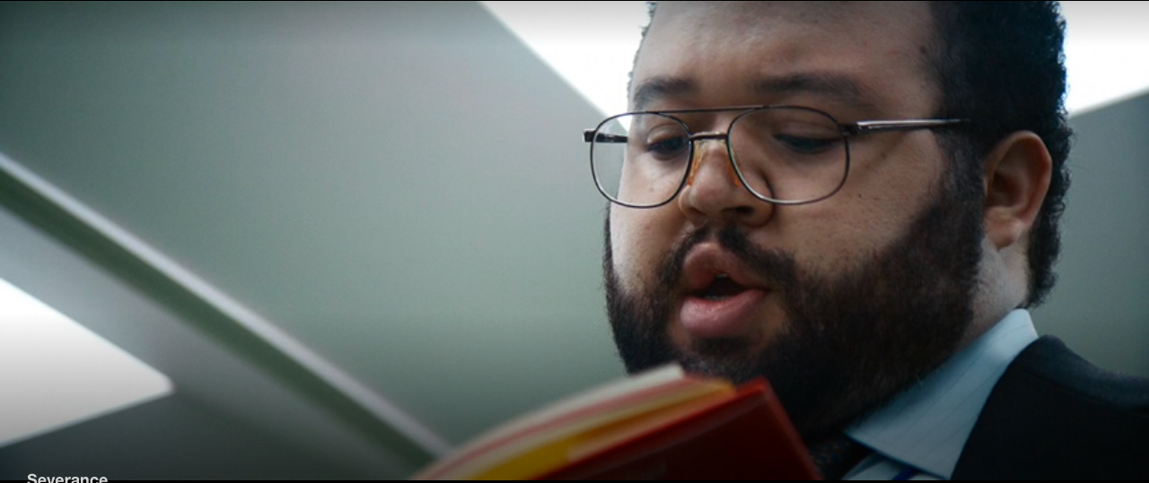 Severance S1Ep4 Dylan Reads Ricken's Book